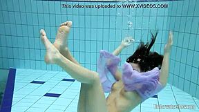 Hey blackhaired Aneta strips bikini pool underwater nudist fun