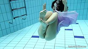 Hey blackhaired Aneta strips bikini pool underwater nudist fun