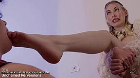 nausi love dominates lucifera in brutal lezdom foot worship session