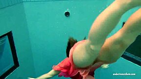 silvie dives in pool bikini slips shows big tits and hairy beaver