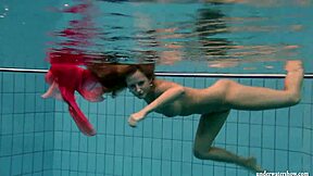 silvie dives in pool bikini slips shows big tits and hairy beaver