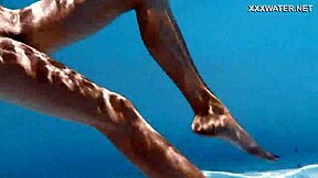 Skinny Hungarian teen Lana swims pool underwater showing juicy ass and small tits