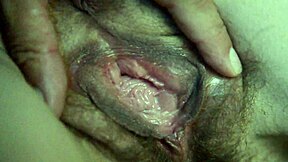 Teen spreads hairy wet pussy closeup in low light voyeur