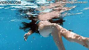 Skinny Hungarian teen Lana swims pool underwater showing juicy ass and small tits