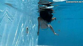Skinny Hungarian teen Lana swims pool underwater showing juicy ass and small tits