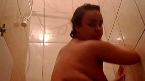 brunette shows big pussy in steamy bath