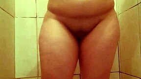 brunette shows big pussy in steamy bath