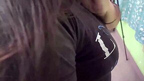 In a cozy bedroom, the cute young Indian couple shares sweet kisses and tender romantic moments together as loving husband and beautiful housewife.