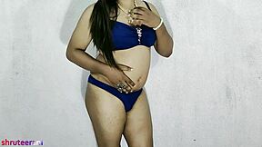 indian shemale teases in blue bikini during steamy crossdressing part 6