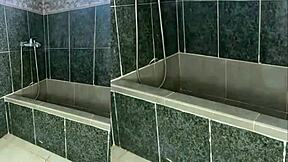 whoa, this kinky nurse milf strips bare, soaping her juicy shaved pussy and toes just for you 🔥🛁