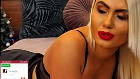 that blonde whore moans loud while fingering her shaved pussy on cam