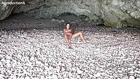 Mona Blue Lounges Solo on Public Beach Outdoors