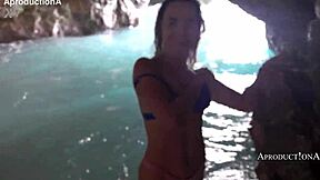 Mona Blue Lounges Solo on Public Beach Outdoors