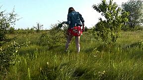 Beautiful cute brunette flashes hairy pussy and ass on wild beach without panties. Short dress rides up for outdoor doggystyle tease.