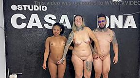 Tanned skinny babe spreads wet pussy on bed moaning as friends lick and fuck in wild homemade orgy