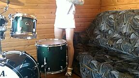 petite brunette teen rams big dildo deep in pussy on drumset