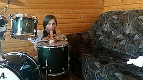 petite brunette teen rams big dildo deep in pussy on drumset