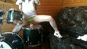 petite brunette teen rams big dildo deep in pussy on drumset