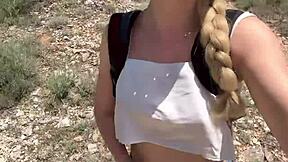 Cute college blonde strips naked in jungle showing natural tits and ass