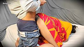 Indian bhabhi bends in saree for delivery boy's creampie doggy fuck