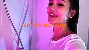 Damn, this super hot Asian teen in panties smokes and teases small tits!