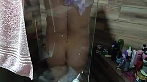 catching my latina aunt shower masturbating her natural tits nearly spots me