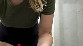 Gym slut fingering ass with plug in public