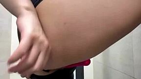 Gym slut fingering ass with plug in public