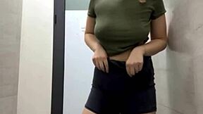 Gym slut fingering ass with plug in public
