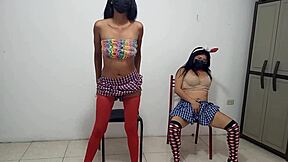 mature latina women dance excitedly in skirts shaking sensual butts for young guy watching closely