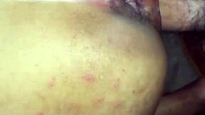 A young couple enjoys intimate bedroom moments together.