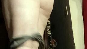 Camgirl slips into grey outfit for intimate ass play session.