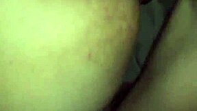 A young couple enjoys intimate bedroom moments together.