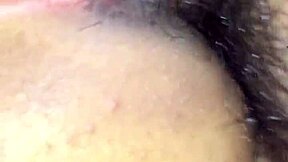 A young couple enjoys intimate bedroom moments together.