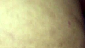 A young couple enjoys intimate bedroom moments together.