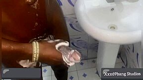 Hot teen strokes pussy furiously under steaming shower spray