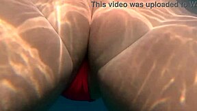 pawg shakes big ass in thong bikini underwater swim.