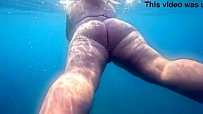 pawg shakes big ass in thong bikini underwater swim.