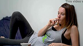 BRUNETTE CUTIE SMOKES AND TEASES PETITE BODY!