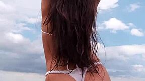 Petite Bikini Babe Teases on Beach in Public