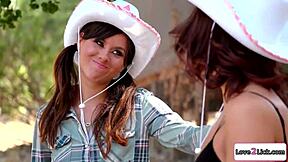 Cowgirl girlfriend leans in for some ass licking fun with her petite brunette lover.