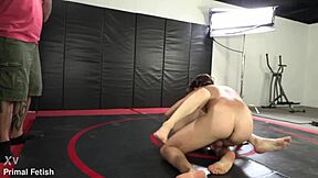mixed nude wrestling match features fiona moore dominating jay romero's muscular body