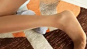 mmm ebony babe teases her sexy legs and feet up close in shiny nylons 😍 wanna see more?