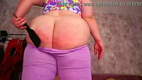 Redhead BBW spanks bare fat ass 100 times on webcam