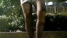 Chinese Ladyboy Strokes Legs in Stockings, Outdoor Cumshot Tease?